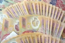Cảnh báo xuất hiện tiền giả loại mới mệnh giá 100.000 đồng và 200.000 đồng
