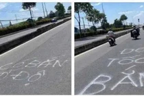 Công an mời làm việc người phun chữ 'bắn tốc độ' trên đường 