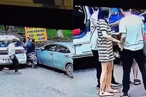 Tài xế ô tô lao xuống đường hành hung một cô gái dã man giữa phố
