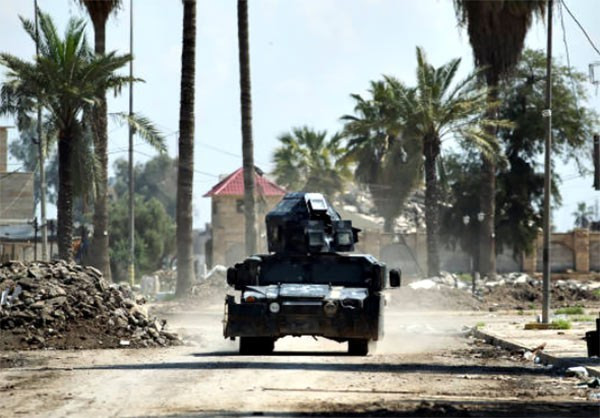 Xe quân sự của lực lượng Iraq tham gia chiến dịch giải phóng Mosul khỏi IS. Ảnh: FNA.