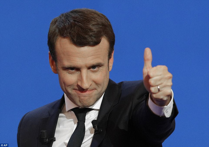 Nếu giành thắng lợi cuối cùng, ông Emmanuel Macron sẽ trở thành tổng thống trẻ nhất của nước Pháp. Ảnh: AP.