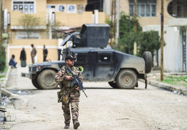 “Lực lượng chống khủng bố Iraq đã giải phóng quận al-Matahen và cắm cờ trên các tòa nhà”, Tướng Yarallah cho hay. Ảnh: FNA.