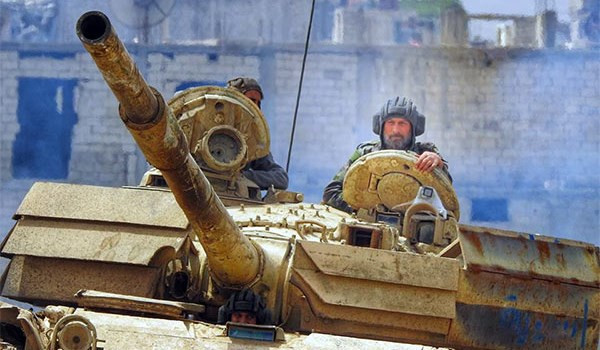 Đồng thời, Syria cũng triển khai lực lượng tiếp viện tới Deir Jamal và Tal Rafat ở phía tây và Tadaf phía bắc Aleppo gần các căn cứ của nhóm phiến quân được Ankara hậu thuẫn. Ảnh: FNA.