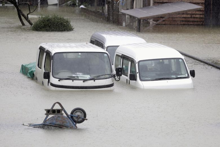 Khu dân cư ngập lụt ở Ise, tỉnh Mie, ngày 12/10 sau khi siêu bão Hagibis đổ bộ. Ảnh: Reuters.