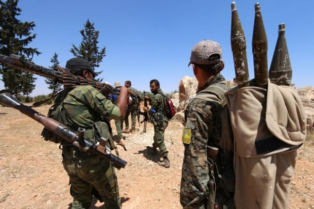 "Chúng tôi tuyên bố ba ngày tổng động viên ở miền Bắc và Đông Syria, người dân hãy hướng đến khu vực biên giới với Thổ Nhĩ Kỳ để thực hiện nghĩa vụ của họ", trích lời kêu gọi của lực lượng người Kurd. Ảnh: AMN.