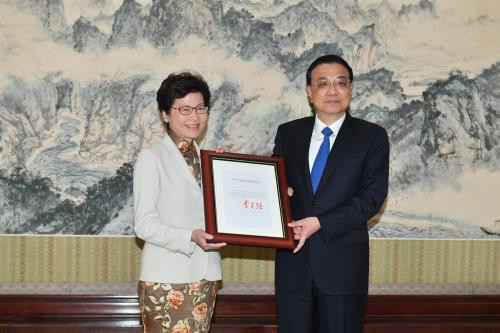 Sau đó, Quốc vụ viện Trung Quốc đã quyết định bổ nhiệm bà Lâm Trịnh Nguyệt Nga giữ chức Trưởng Khu hành chính Đặc biệt Hong Kong, và bắt đầu nhiệm kỳ 5 năm từ ngày 1/7/2017. Ảnh: EPA.