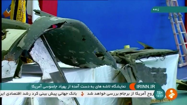Truyền hình Iran đăng tải hình ảnh về mảnh vỡ của một chiếc UAV của Mỹ bị bắn hạ, ngày 21/6.