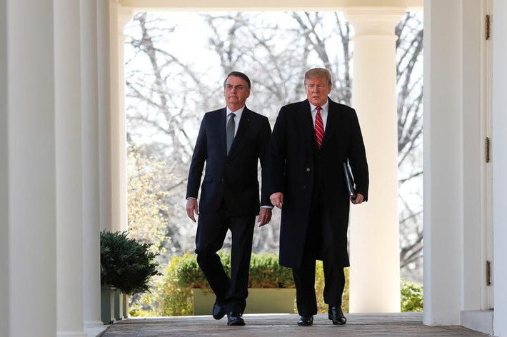 Ngày 19/3, Tổng thống Brazil Jair Bolsonaro đã có cuộc hội đàm với Tổng thống Mỹ Donald Trump sau khi tới tới thủ đô Washington. (Nguồn ảnh: Reuters)