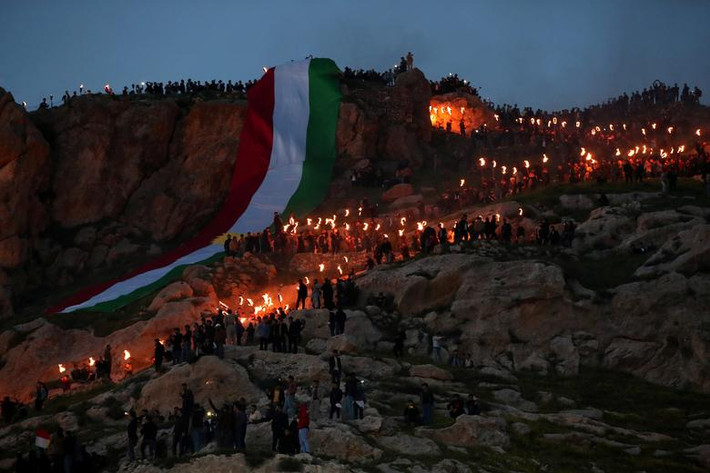 Theo hãng thông tấn Reuters, đông đảo người Kurd tại Khu tự trị Kurdistan ở Iraq đang ăn mừng lễ Nowruz, đánh dấu ngày đầu tiên của mùa xuân và bắt đầu năm mới theo lịch Iran. (Nguồn ảnh: Reuters)
