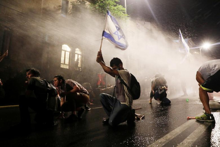 Cuộc biểu tình phản đối cách chính quyền Thủ tướng Israel Benjamin Netanyahu xử lý cuộc khủng hoảng COVID-19 và cáo buộc tham nhũng tại Jerusalem ngày 18/7.
