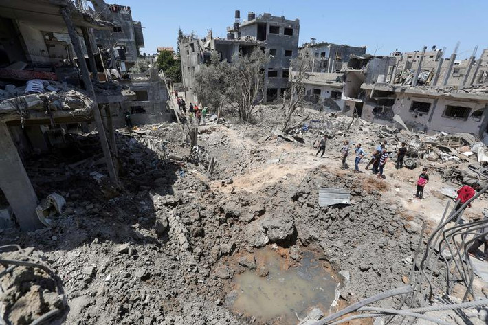 Nhiều ngôi nhà ở phía bắc Dải Gaza đã bị phá hủy hôm 14/5.