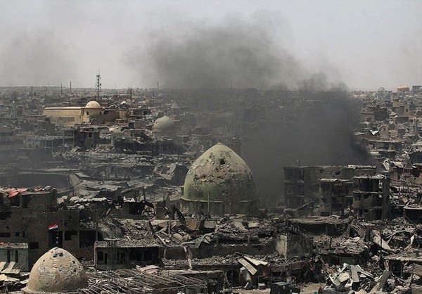 Khói bốc lên tại một địa điểm ở thành phố Mosul. Ảnh: FNA.