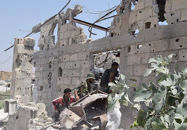 “Sau các cuộc giao tranh với nhóm khủng bố Mặt trận al-Nusra ở vùng Ayn Tarma, quân đội Syria đã giành quyền kiểm soát thêm nhiều khu vực ở Đông Ghouta”, nguồn tin cho hay. Ảnh: FNA.