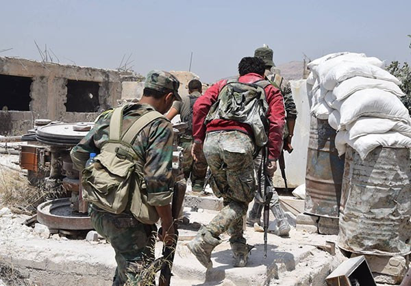 Các binh sĩ Syria tham gia chiến dịch quân sự ở Đông Damascus. Ảnh: FNA.
