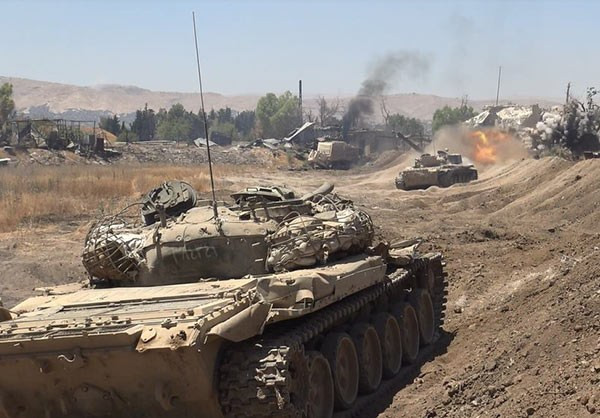 Được biết, quân đội Syria đã đẩy mạnh các cuộc tấn công nhằm vào tuyến phòng thủ của nhóm khủng bố ở Đông Ghouta. Ảnh: FNA.