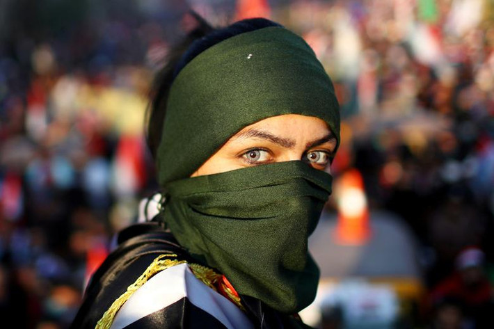 Iraq: Người phụ nữ tham gia cuộc biểu tình chống chính phủ tại Baghdad ngày 1/11.