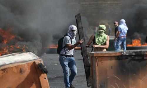 Khói đen bao trùm khu vực xảy ra đụng độ đẫm máu giữa Palestine - Israel ngày 12/10.