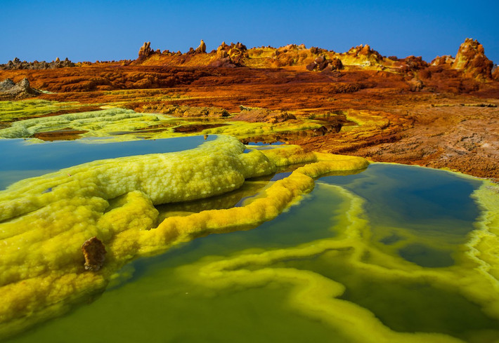 Vùng đất lún Danakil nằm trên sa mạc ở Ethiopia là một trong những nơi có nhiệt độ trung bình năm cao nhất hành tinh, với nhiệt độ trung bình năm lên tới 35°C và có thời điểm đạt gần 63°C vào mùa hè. Ảnh: Getty.