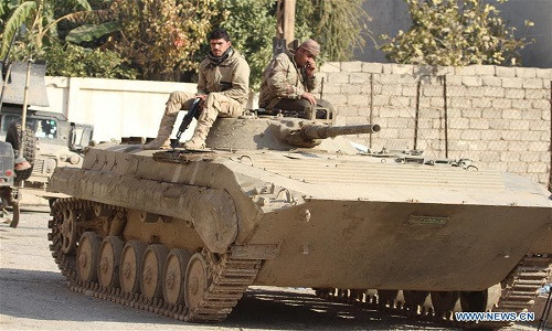 Quân đội Iraq cho biết, các lực lượng an ninh nước này đã giành lại quyền kiểm soát thêm 4 quận ở thành phố Mosul từ tay phiến quân IS hôm 10/12. Ảnh: Tân Hoa Xã.