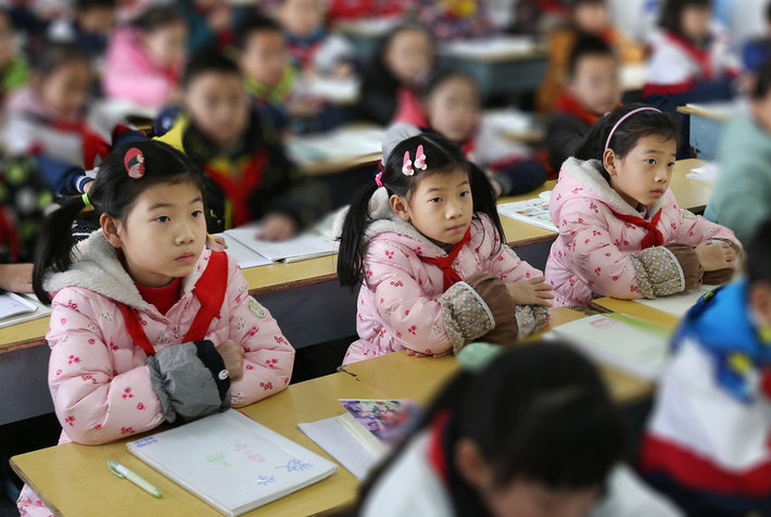 Cặp sinh ba Yu Chunxiao, Yu Xiaxu và Yu Qiushi giống nhau đến mức bố mẹ của các em cũng có lúc nhầm lẫn.