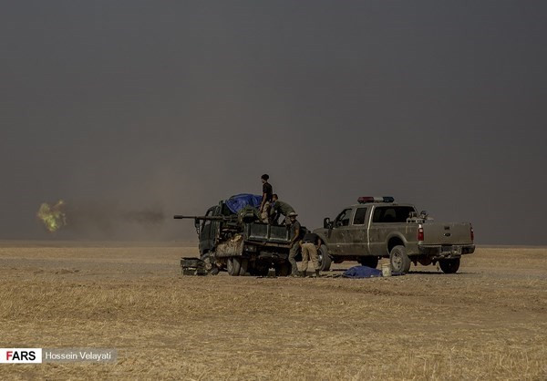 “Các lực lượng Iraq đã giành lại quyền kiểm soát ngôi làng phía đông bắc huyện Rashad”, kênh truyền hình Mayadeen đưa tin. Ảnh: FNA.