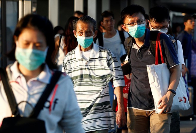 Vào ngày 8-9/2/2021, Singapore sẽ tiến hành xét nghiệm miễn phí cho tất cả các chủ cửa hàng, người bán hàng ăn uống, thực phẩm và người giao hàng quanh khu vực Chinatown. Ảnh: Reuters.