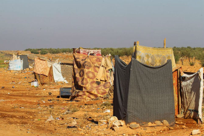 Nhà vệ sinh ngoài trời ở gần khu trại dành cho người tị nạn Syria ở tỉnh Idbib ngày 20/11/2015.