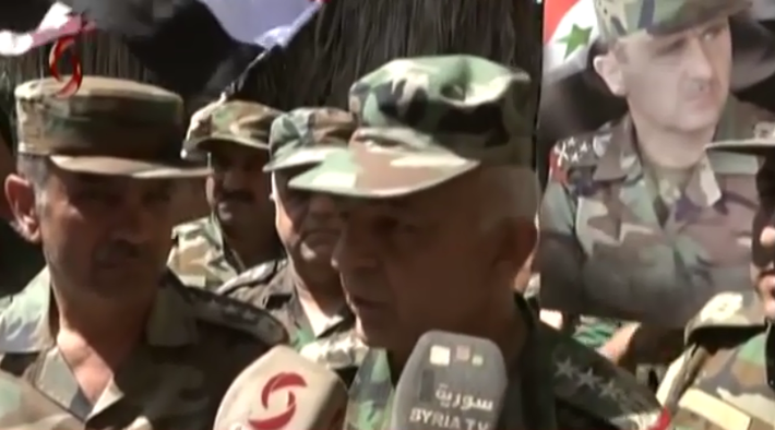 “Quân đội Syria đã tiến vào trong thành phố Daraa, nơi từng nằm dưới sự kiểm soát của các tay súng phiến quân từ năm 2011, và treo cờ Syria trên các tòa nhà thành phố”, FNA đưa tin. Ảnh chụp màn hình.