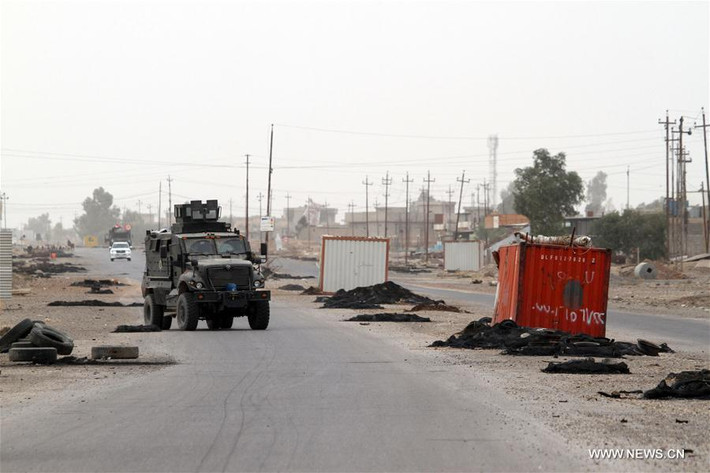 Các lực lượng Iraq trên đường phố ở quận Gogjali.