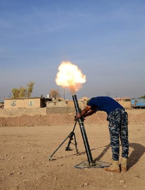 Hình ảnh giao tranh trên chiến trường Mosul hôm 9/11 trong bối cảnh chiến dịch giải phóng thành phố này khỏi ách thống trị của tổ chức khủng bố IS đã bước sang tuần thứ tư.