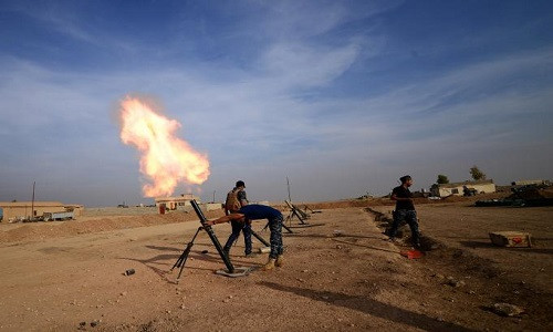 Các lực lượng cảnh sát liên bang Iraq tấn công căn cứ của phiến quân IS ở phía nam thành phố Mosul, Iraq, ngày 9/11.