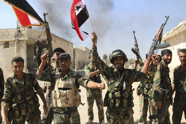 Theo hãng Fars (Iran), Quân đội Syria tiếp tục tiến quân ở vùng nông thôn phía nam Idlib ngày 26/11 và giành lại quyền kiểm soát một thị trấn chiến lược trong khu vực. Ảnh: AMN.