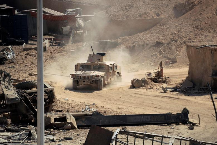 Một chiếc xe bọc thép của SDF trong chiến dịch giải phóng Raqqa. Ảnh: Reuters.