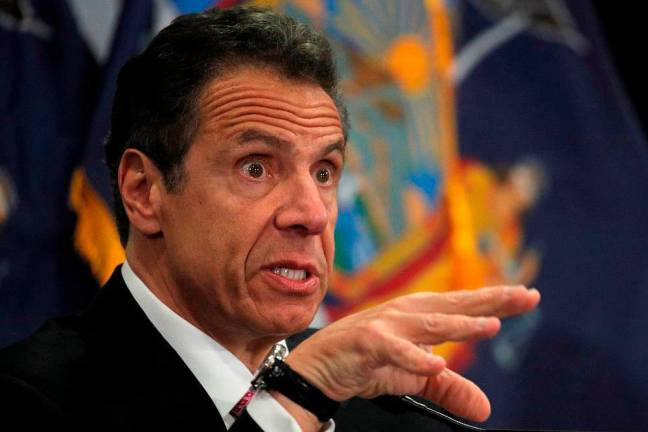 Ông Cuomo từng có thời gian ngắn làm việc tại Công ty luật Blutrich, Falcone & Miller. Ông đã thành lập Công ty Nhà ở cho những người kém đặc quyền (HELP) vào năm 1986 và rời hãng luật để tập trung điều hành HELP vào năm 1988. Ảnh: Reuters.