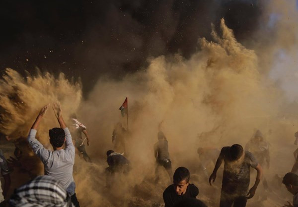Các quan chức y tế Gaza cho hay, lực lượng Israel đã bắn chết 7 người Palestine trong cuộc biểu tình hôm 12/10. Ngoài ra, khoảng 140 người khác bị thương trong cuộc đụng độ dữ dội tại Dải Gaza. Ảnh: FNA.