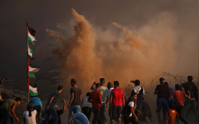 Hình ảnh trong cuộc biểu tình dữ dội ở Dải Gaza ngày 12/10. Ảnh: Reuters.