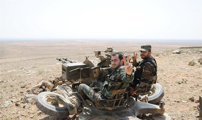 Trong diễn biến liên quan trên chiến trường Syria, Quân chính phủ Damascus tiếp tục chiến dịch quân sự tại vùng Al-Safa nhằm giải phóng khu vực này khỏi tay các phần tử khủng bố IS. Ảnh: Xinhuanet.