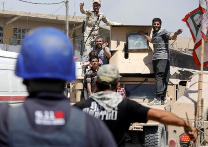 Trước đó, ngày 18/6, các lực lượng Iraq bắt đầu tấn công vào Thành cổ Mosul nhằm quét sạch các phần tử khủng bố IS trong khu vực này. Ảnh: Reuters.