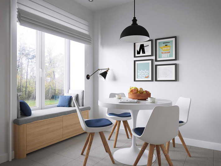 Khu vực ăn uống với màu trắng chủ đạo, khung cửa kính lớn mang ánh sáng đến khắp phòng, tạo cảm giác thoáng đãng, thư thái.