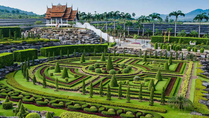 Sau chuyến du lịch quốc tế, bà Nongnooch ấn tượng với vẻ đẹp của những khu vườn nổi tiếng khắp thế giới, và quyết định biến vườn cây ăn trái thành một khu vườn nhiệt đới đầy hoa và cây cảnh. Ảnh: Nongnoochtropicalgarden.