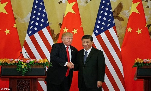 Hai bên cũng cam kết nỗ lực phi hạt nhân hóa trên bán đảo Triều Tiên. Tuy nhiên, Chủ tịch Tập Cận Bình cho rằng đối thoại vẫn là biện pháp cần thiết để giải quyết cuộc khủng hoảng. Ảnh: EPA.