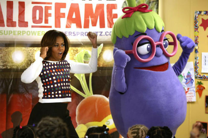 Đệ nhất phu nhân Michelle Obama nhảy vui nhộn tại trung tâm chăm sóc trẻ em Học viện La Petite ở Bowie, Maryland ngày 27/2/2014.