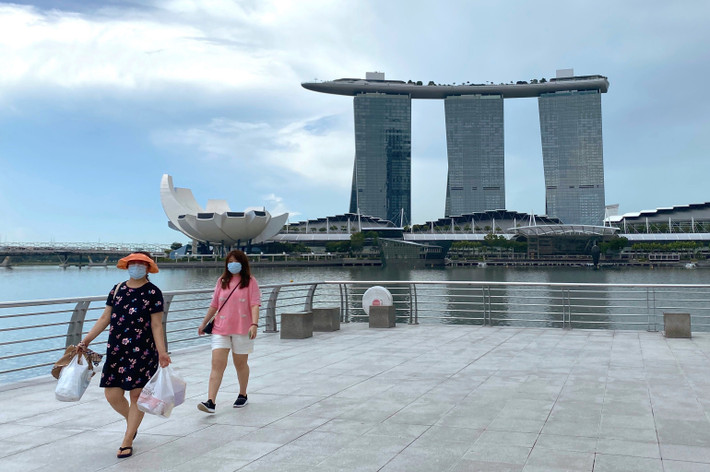 Ngoài ra, người dân Singapore cũng sẽ được phép đi du lịch trở lại, ít nhất là đến các quốc gia cũng đã kiểm soát được dịch bệnh. Ảnh: AP.