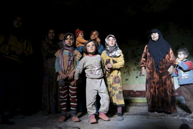 Người dân Syria sống trong hang động với “ngôi nhà” tạm bợ.