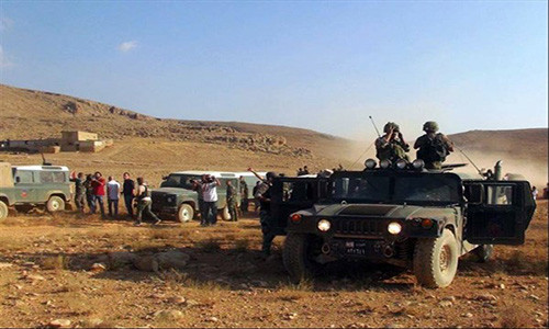 Hãng Fars (Iran) đưa tin, quân đội Syria và Hezbollah thắng lớn khi đánh bật các tay súng IS ra khỏi hơn 85% cao điểm ở Tây Qalamoun. Ảnh: FNA.
