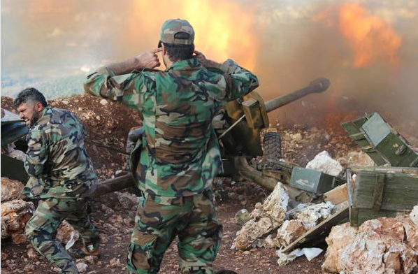 Cũng tại khu vực này, các chiến đấu cơ Syria dội bão lửa xuống thị trấn Al-Sirmaniyeh, nằm ở phía đông Kabani gần đồng bằng al-Ghaab. Ảnh: AP.