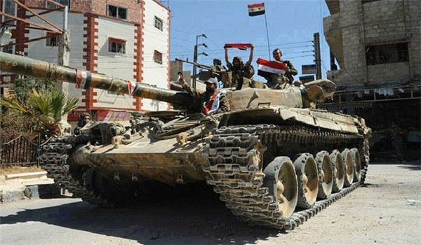 "Hàng trăm binh sĩ Syria đã được điều động tới thị trấn Sanamayn ở Bắc Daraa, sau khi các tay súng thánh chiến liên tục tiến hành các cuộc tấn công nhằm vào lực lượng chính phủ Damascus trong khu vực thời gian gần đây", AMN đưa tin. Ảnh: FNA.