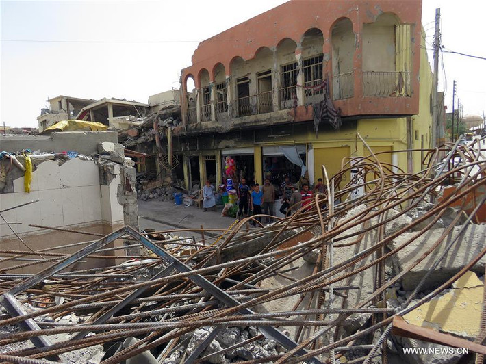 Những ngôi nhà đổ nát ở khu Mosul Mới. Ảnh: THX.
