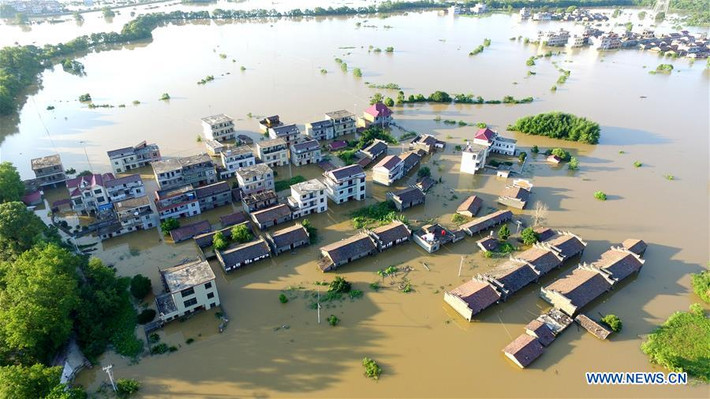 Mưa lũ ở Giang Tây cũng đã phá hủy 4,56 triệu ha hoa màu và 988 ngôi nhà, gây thiệt hại trực tiếp ước tính là 6,5 tỷ nhân dân tệ (tương đương 929 triệu USD), CCTV đưa tin. Ảnh: THX.