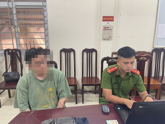 Đối tượng Đặng Chí Thành tại cơ quan Công an. capture.png